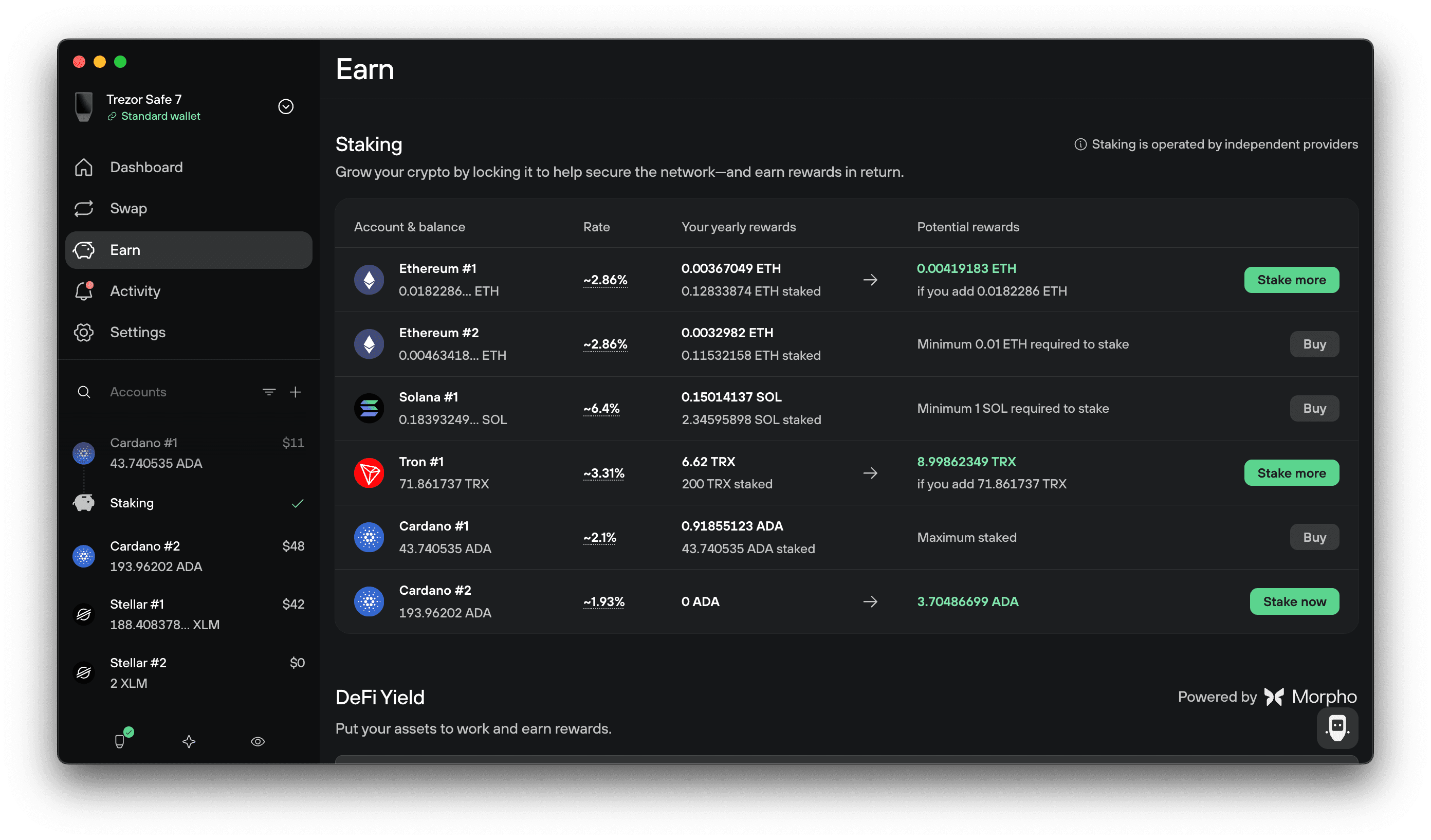 Trezor Suite Earn page lists staking rates and rewards for Ethereum, Solana, Tron, and two Cardano accounts.