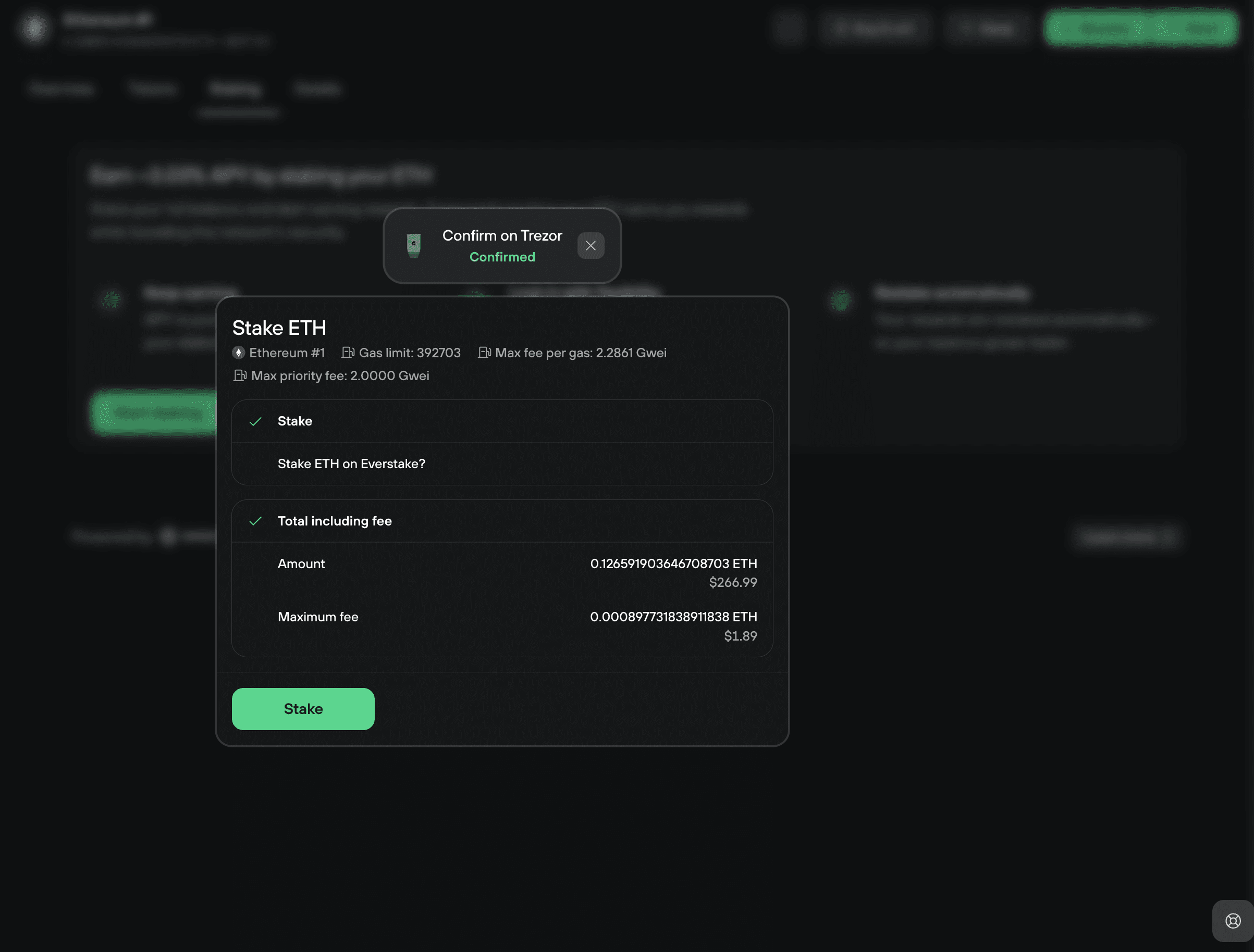 Stake review modal showing confirmed Trezor check, amount, gas details, and maximum fee