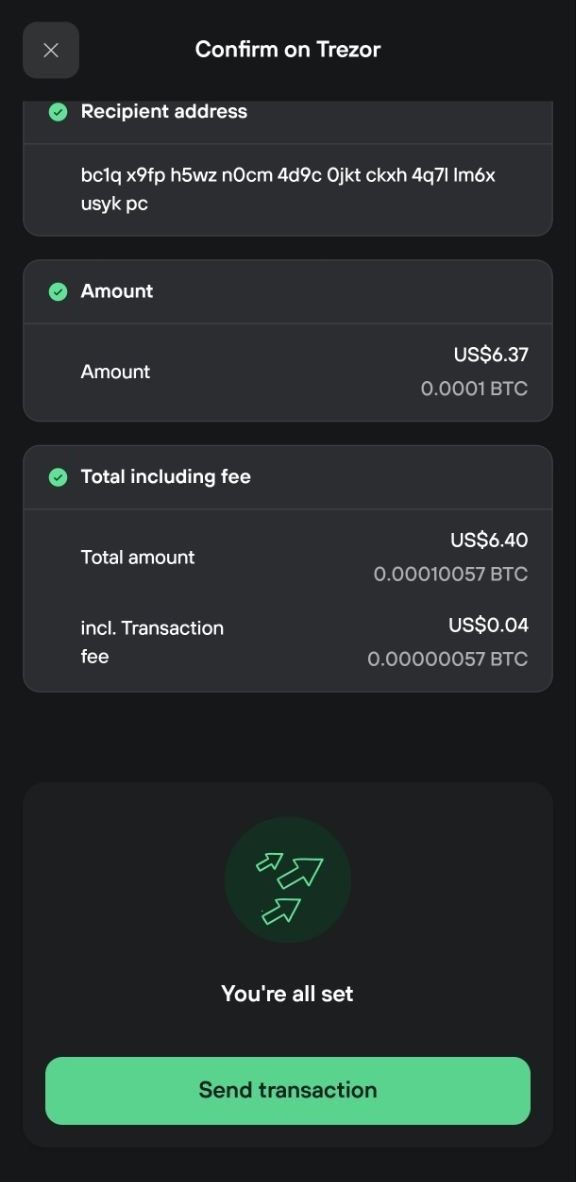 Trezor Suite mobile confirms recipient, amount, and fee before the Send transaction button.