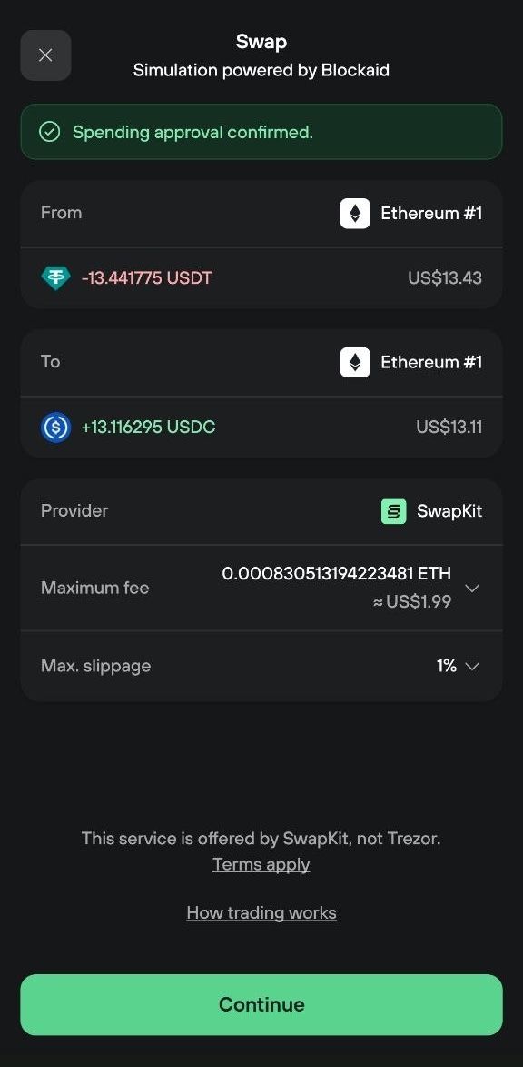 Mobile swap review after approval: USDT to USDC via SwapKit with maximum fee and 1% max slippage