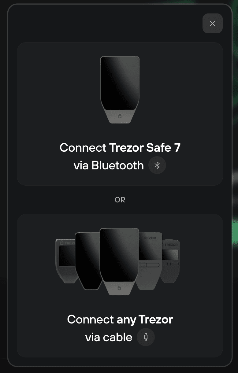 Trezor Suite pop-up showing two connection options: Trezor Safe 7 via Bluetooth or any Trezor via cable.