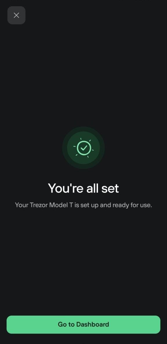 Trezor Model T setup complete screen shows a success check and Go to Dashboard button