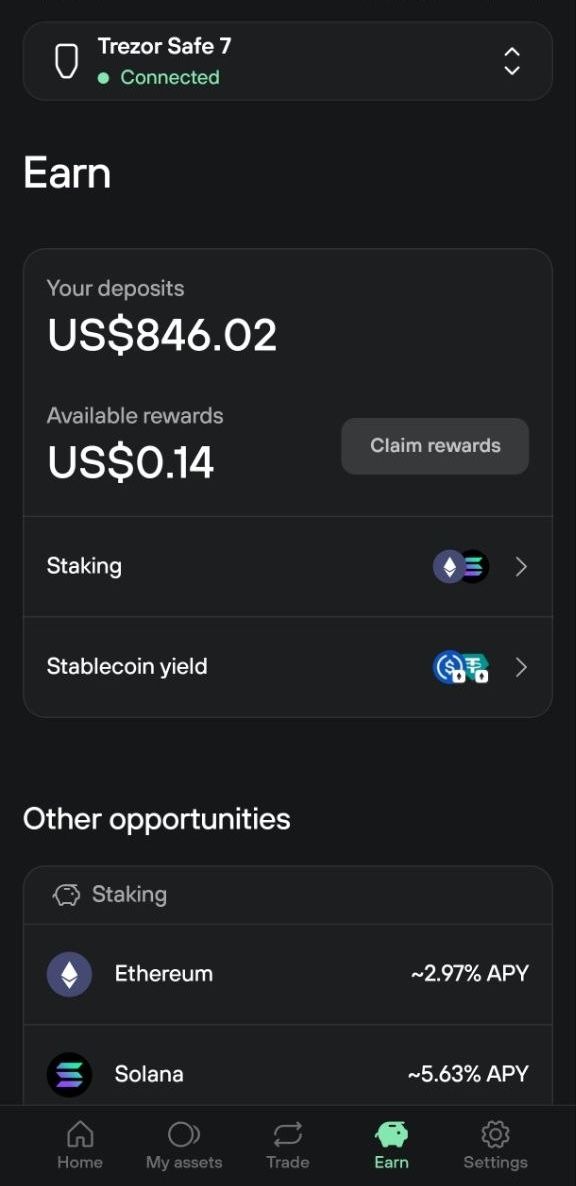 Trezor Suite Earn overview shows $846.02 deposited, $0.14 in rewards, and staking and stablecoin yield options.