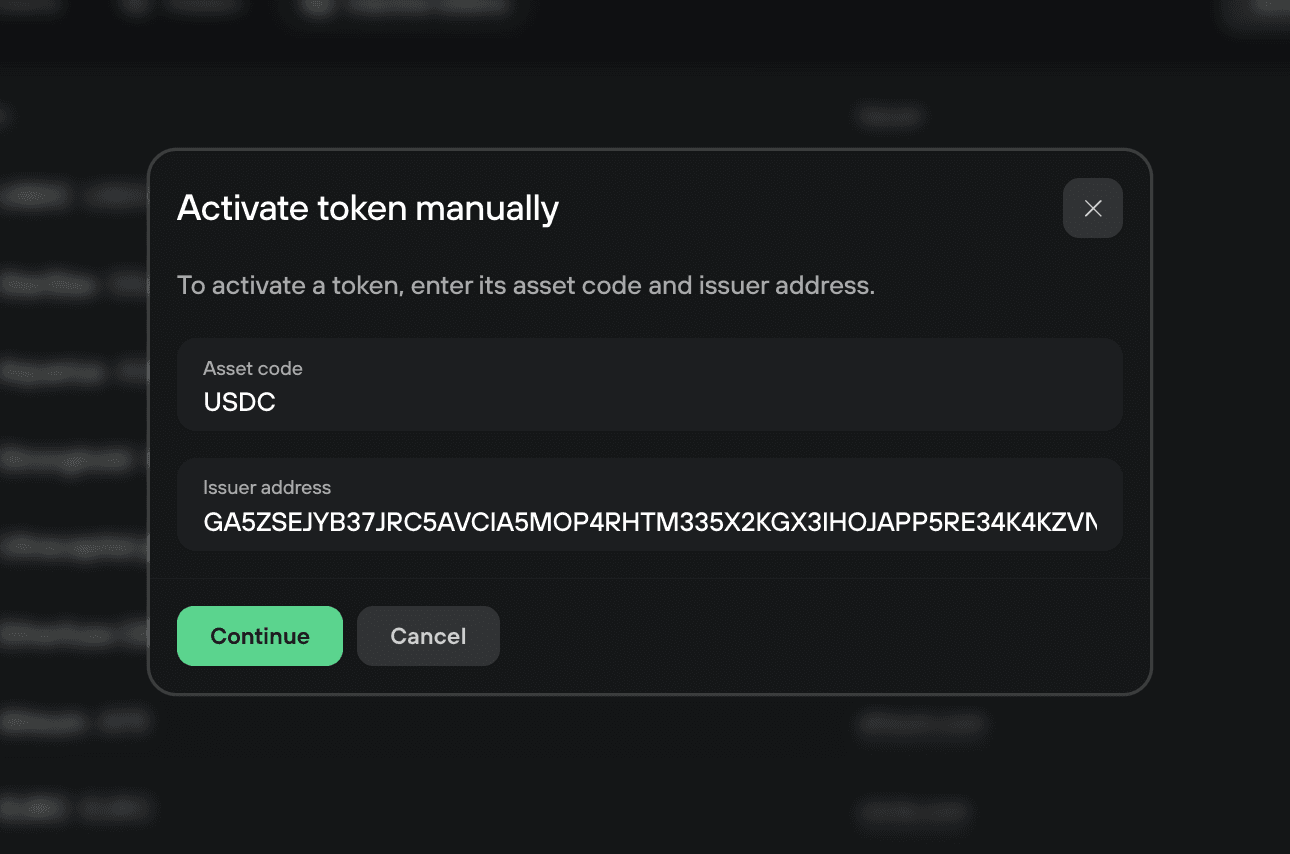 Manual token activation modal filled with USDC asset code and issuer address, with Continue enabled
