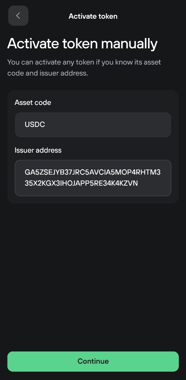 Trezor Suite manual token activation screen with asset code, issuer address fields, and continue button