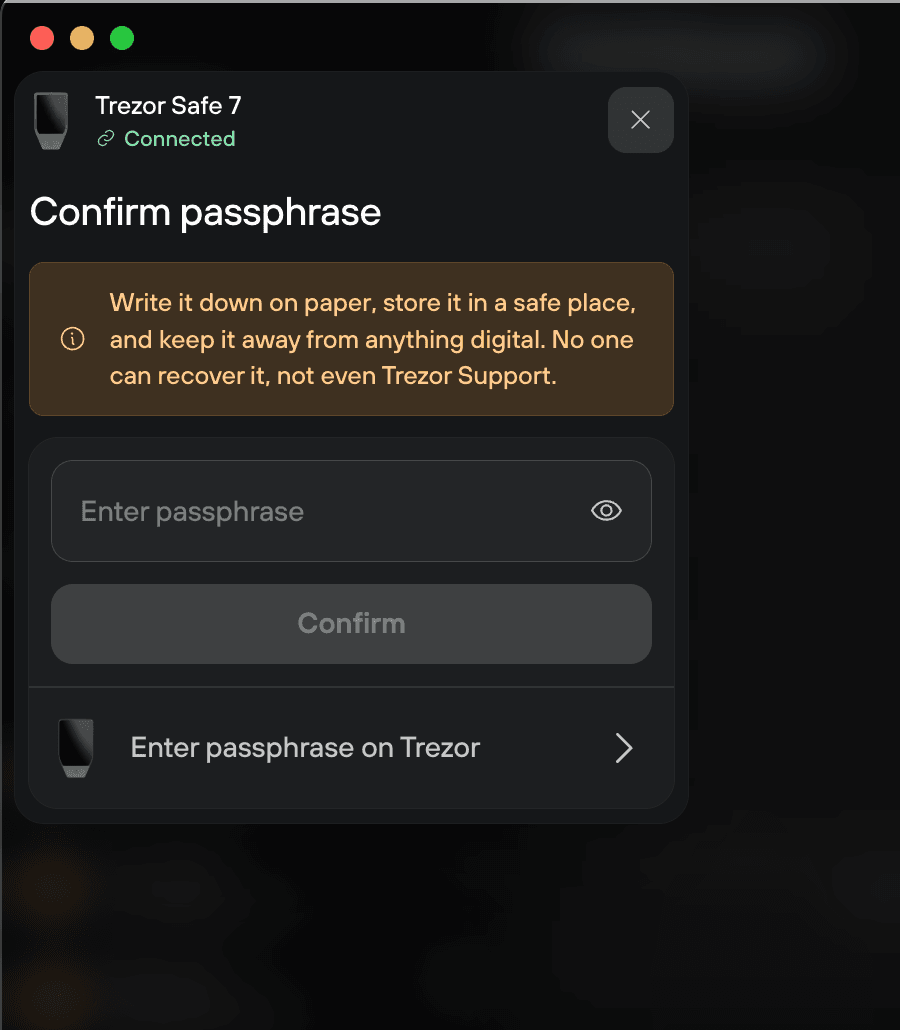 Confirm passphrase screen warns to store the passphrase offline, with options to enter it in Suite or on Trezor.