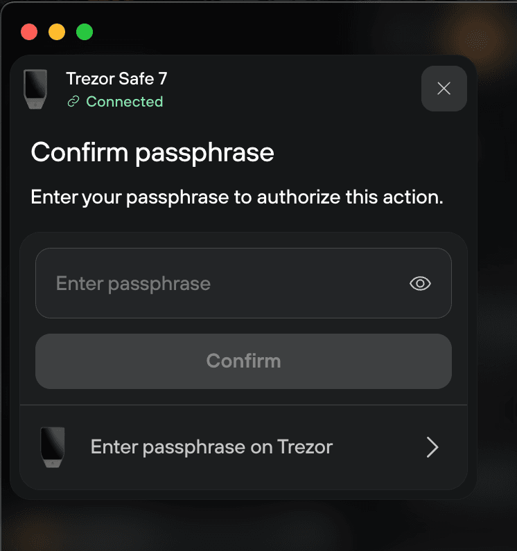 Trezor Safe 7 passphrase confirmation dialog with options to enter the passphrase in the app or on the device.