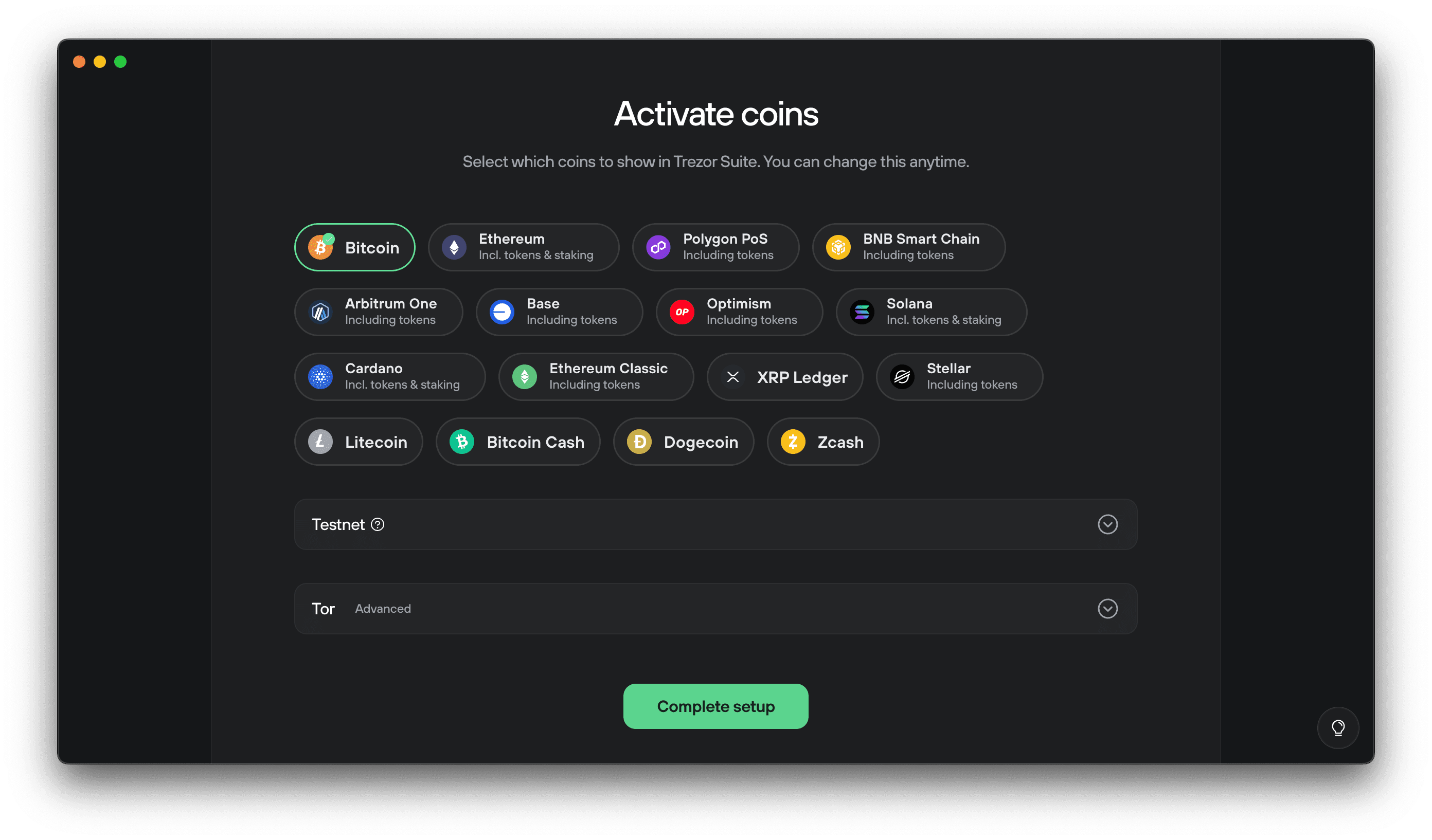 Trezor Suite’s coin activation screen showing selectable asset buttons and a green “Complete setup” button.