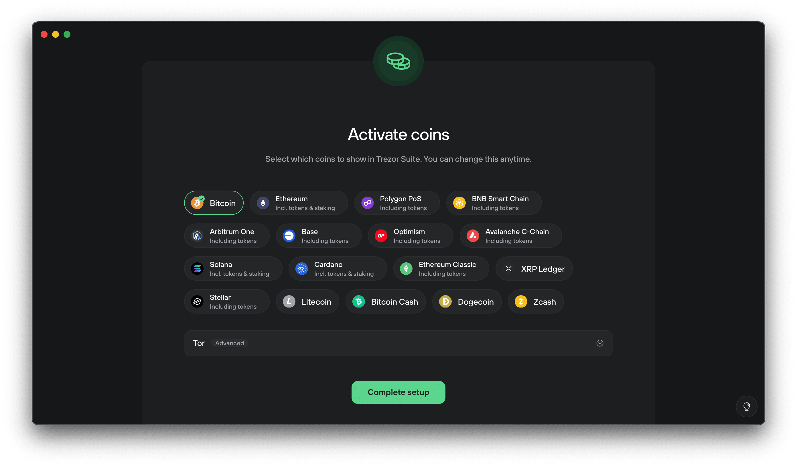 Trezor Suite’s coin activation screen showing selectable asset buttons and a green “Complete setup” button.