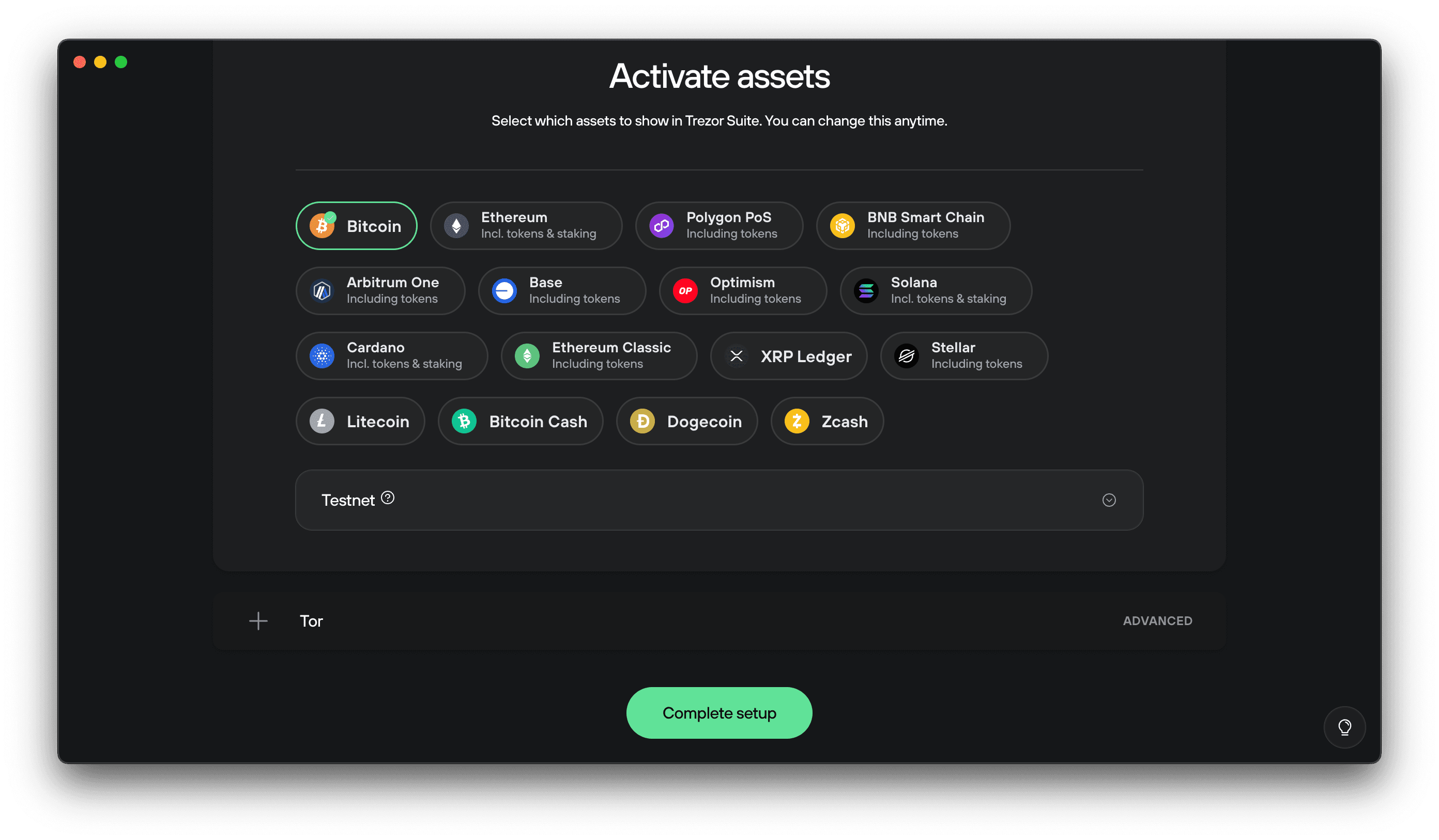 Trezor Suite screen showing “Activate assets” with options for Bitcoin, Ethereum, and other coins, and a green Complete setup button.