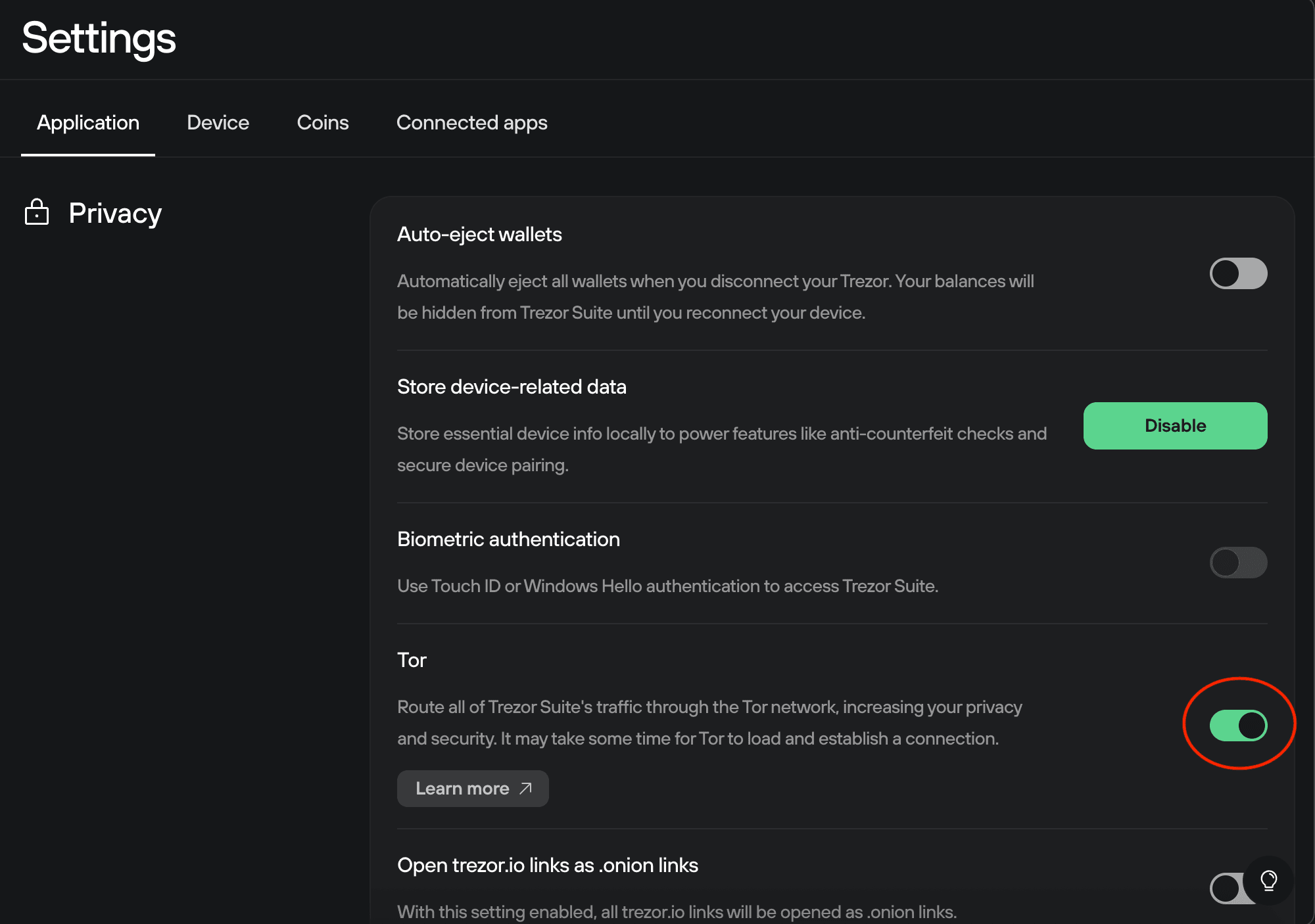 Trezor Suite Settings → Privacy section showing multiple privacy options, with the Tor routing toggle switched on.